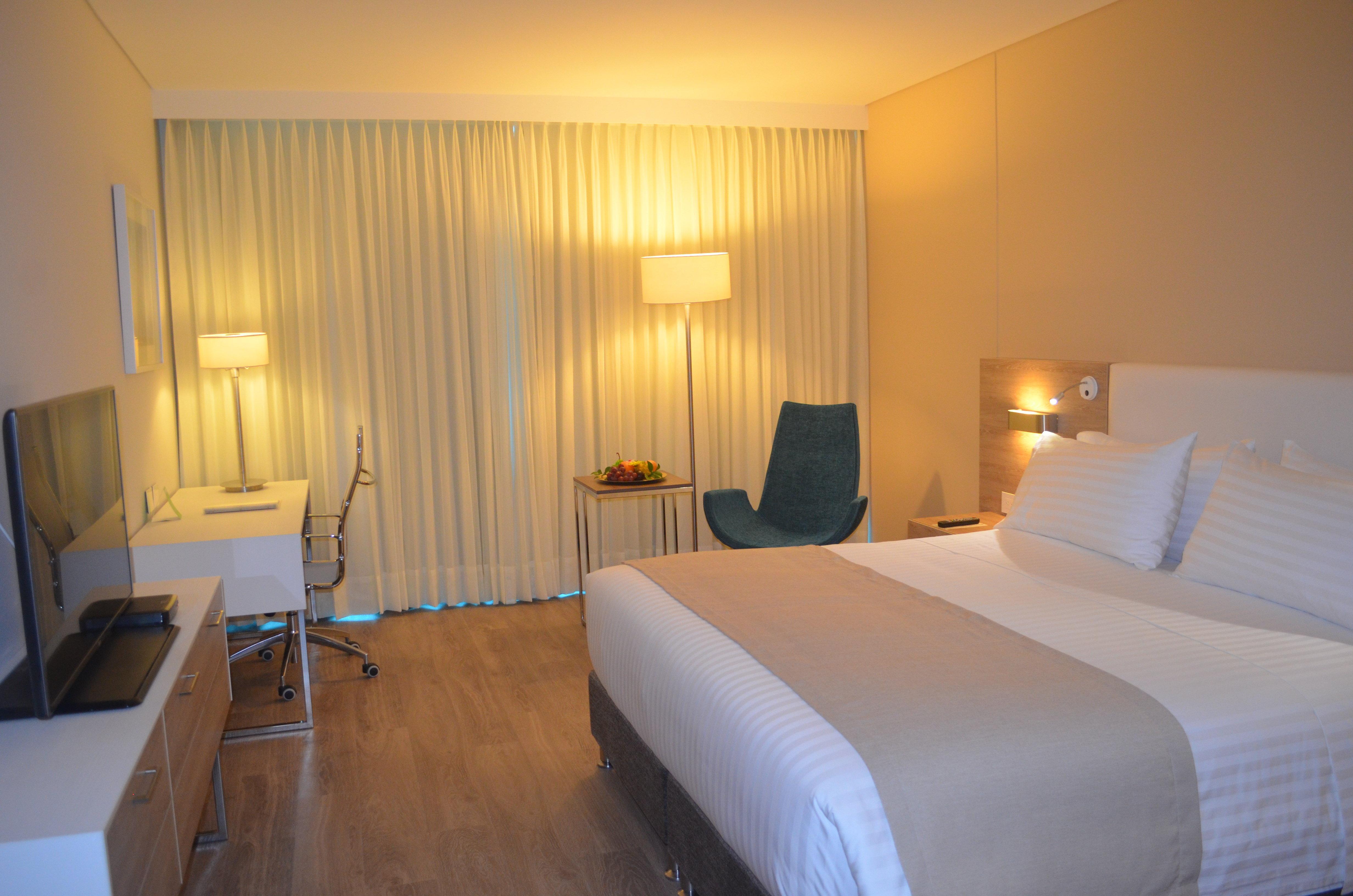 ฮอลิเดย์อินน์ กูกูตา ภายนอก รูปภาพ A room at the hotel